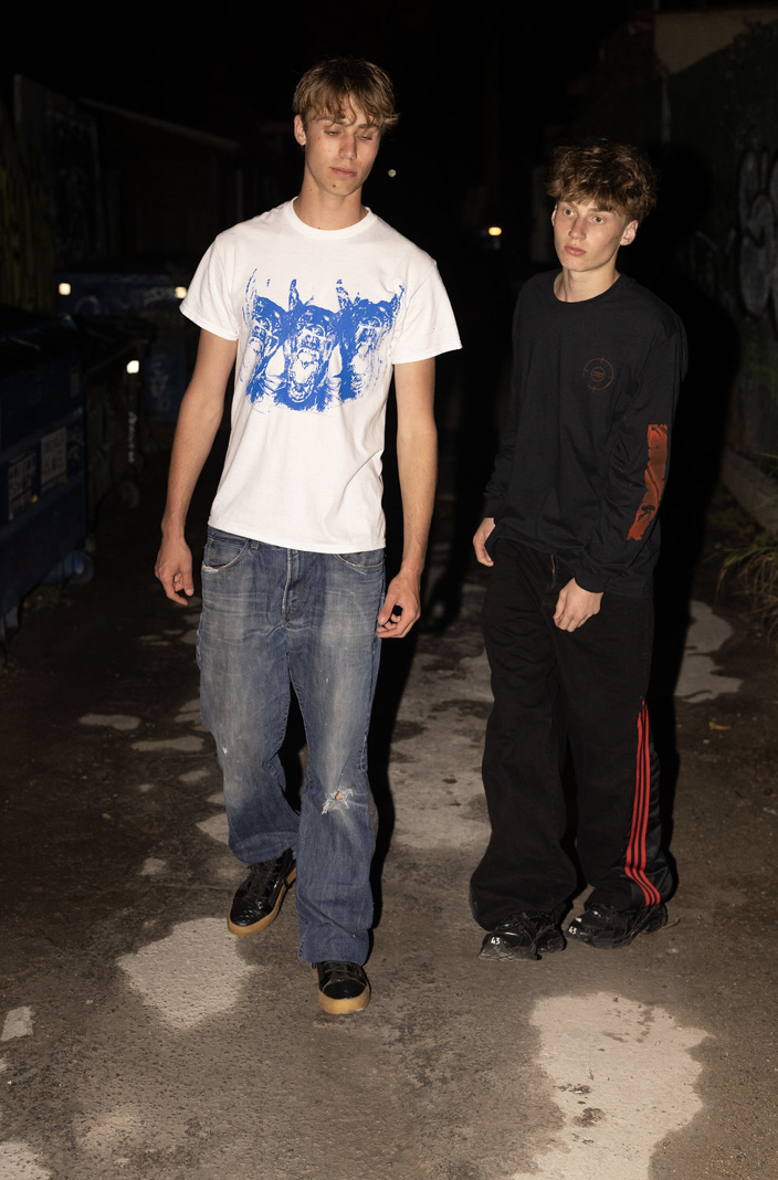 White Smack Clothing tee with blue animal print
