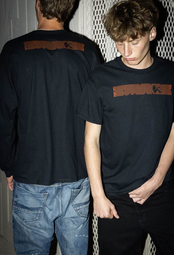 Black Smack Clothing tee with brown logo print